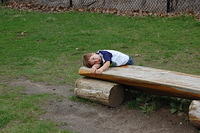 justin laying on bench
